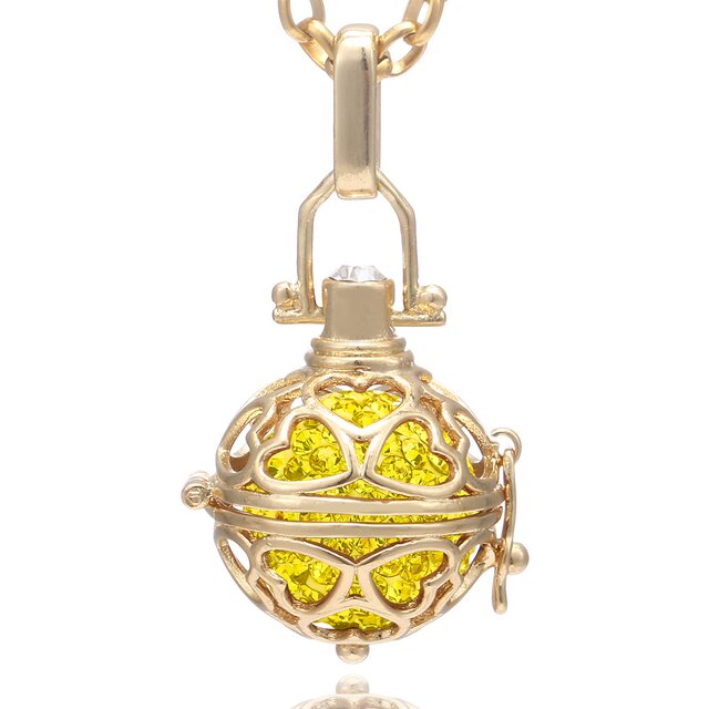 Morella Damen Halskette Edelstahl gold 70 cm mit Herz Anhänger und Klangkugel gelb Ø 16 mm in Schmuckbeutel
